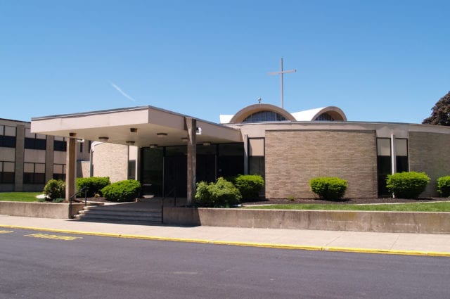 exterior view and entrance for a catholic school