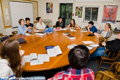high school students in round table discussion at college prep