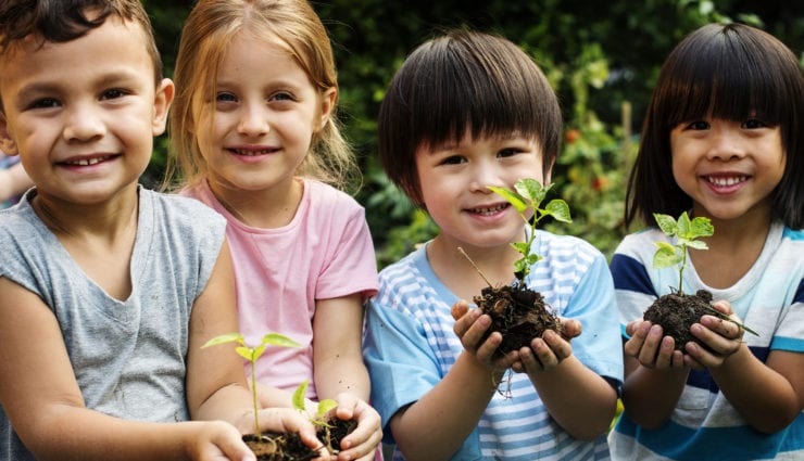 Group of kindergarten kids friends gardening agriculture