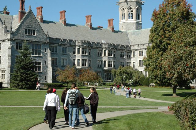 Students walk through Gothic style campus