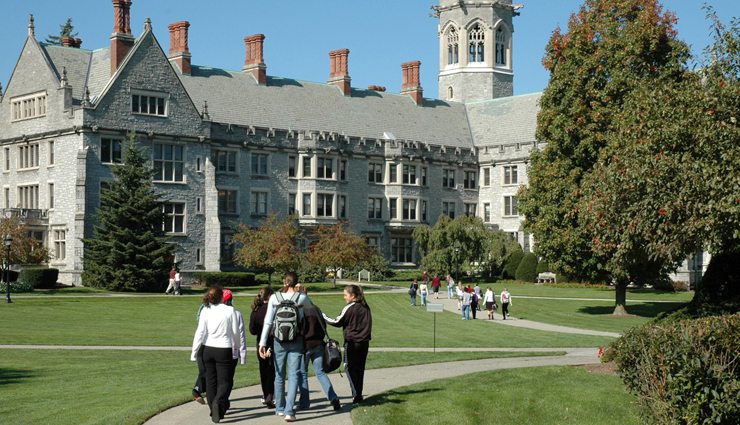 Students walk through Gothic style campus