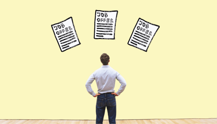 A man standing in front of a yellow wall with illustrations of three job offers