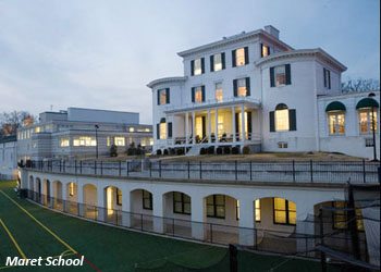 Dusk at athletic fields and campus buildings at Maret School