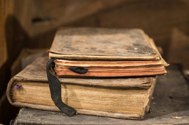 Very old deteriorated books 16th century, vintage composition