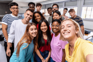 Group of multicultural high school students taking a selfie