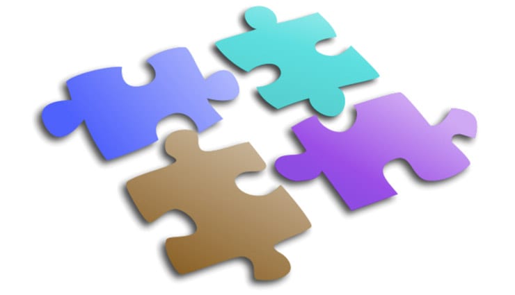 four varying colored puzzle pieces