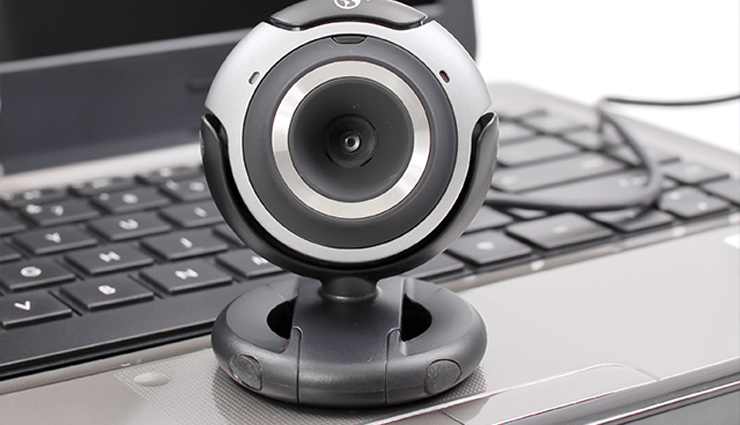 closeup webcam sits on laptop