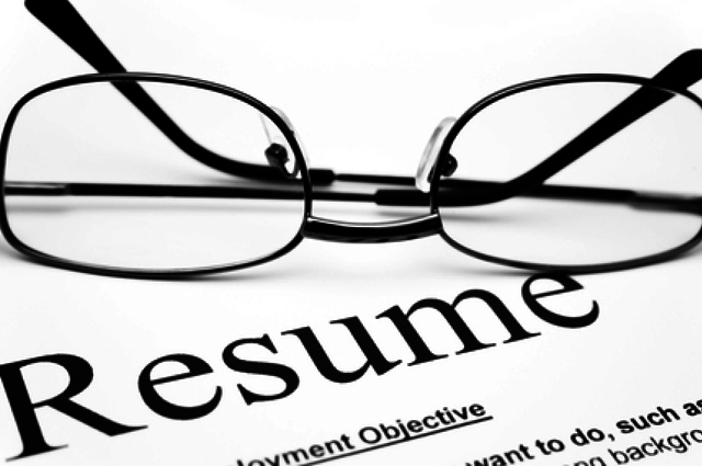 upside down glasses rest on top of Resume