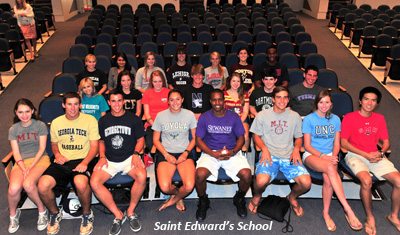 group of high school seniors wearing college t shirts