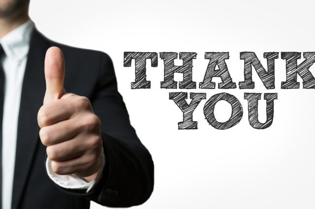 The words thank you with a man giving a thumbs up