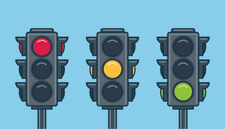 Illustration of three traffic lights, one red, one yellow, one green