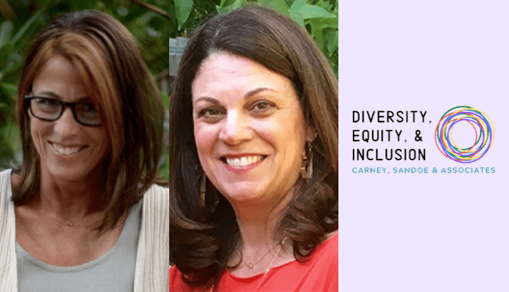 Smiling person standing next to a sign that reads "Diversity, Equity, and Inclusion" with nature in the background.