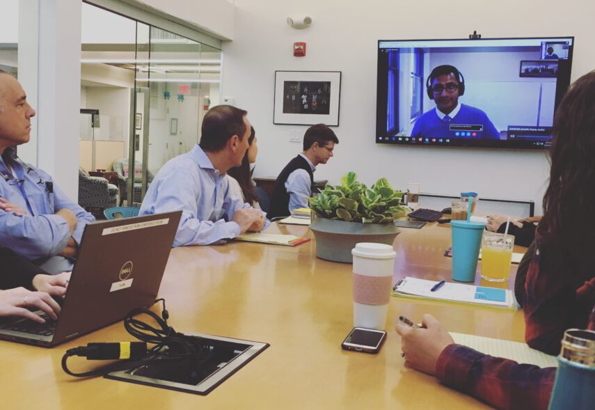 CS&A staff sitting around conference table