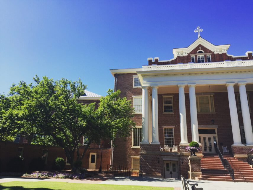 St. Mary's school building with red bricks and white columns