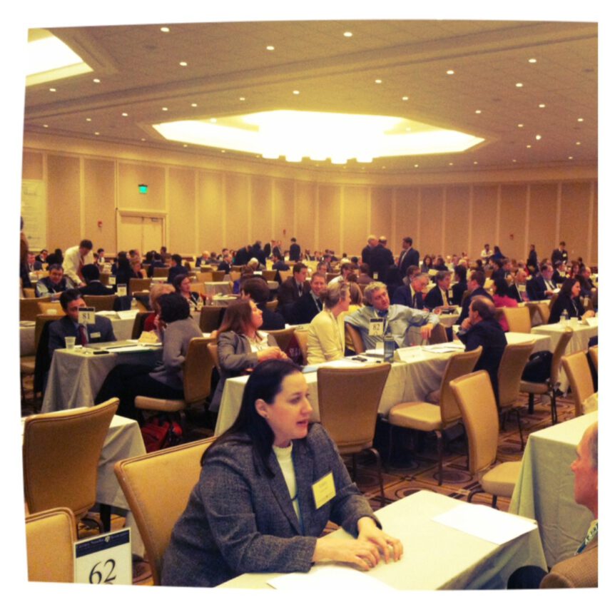 tables in a ballroom of conference interviews