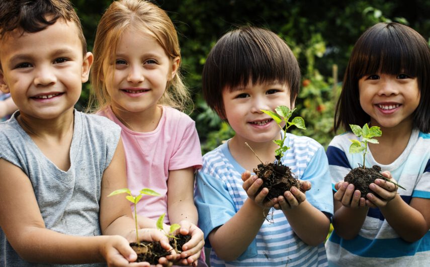 Group of kindergarten kids friends gardening agriculture
