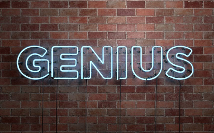 GENIUS - fluorescent Neon tube Sign on brickwork
