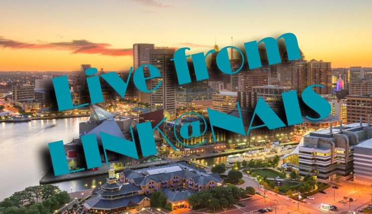 Baltimore downtown cityscape at dusk with LINK logo