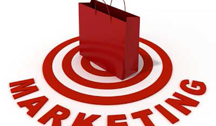 Red target with red bag on top and marketing written below