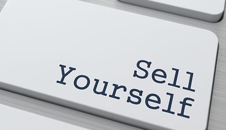 zoomed in keyboard key reads "sell yourself"