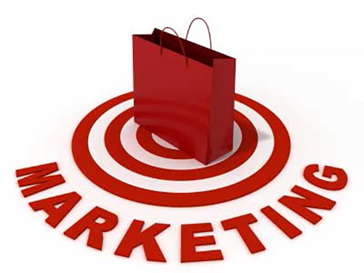 Red target with red bag on top and marketing written below