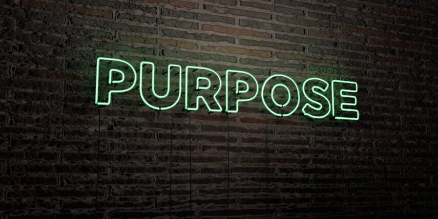 The word purpose as a green neon sign
