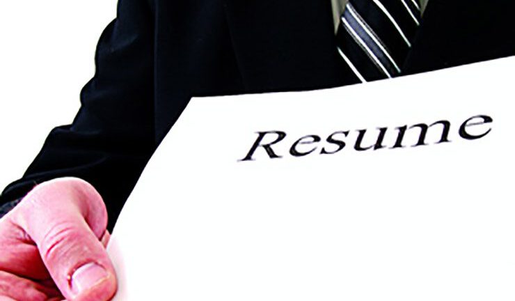 business man hands over a resume
