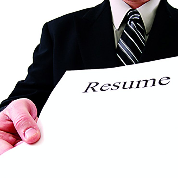 business man hands over a resume