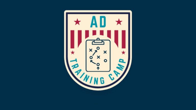 Emblem with AD Training Camp text, featuring a clipboard with strategy markings and red stripes on a blue background.